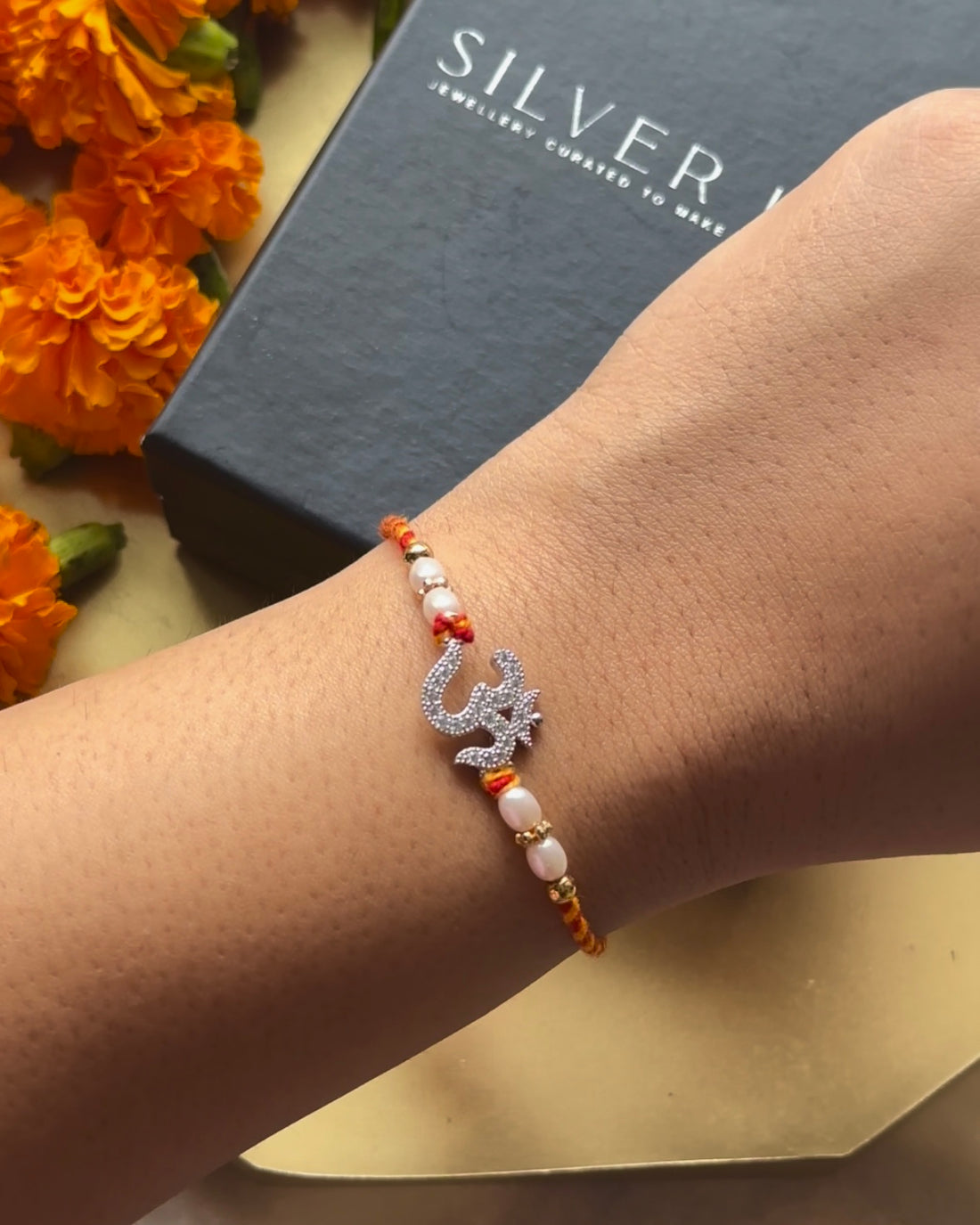 OM Silver Rakhi